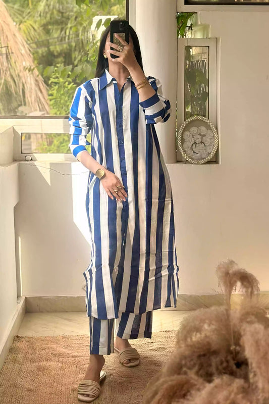 Woman wearing blue stripe cotton button-down shirt